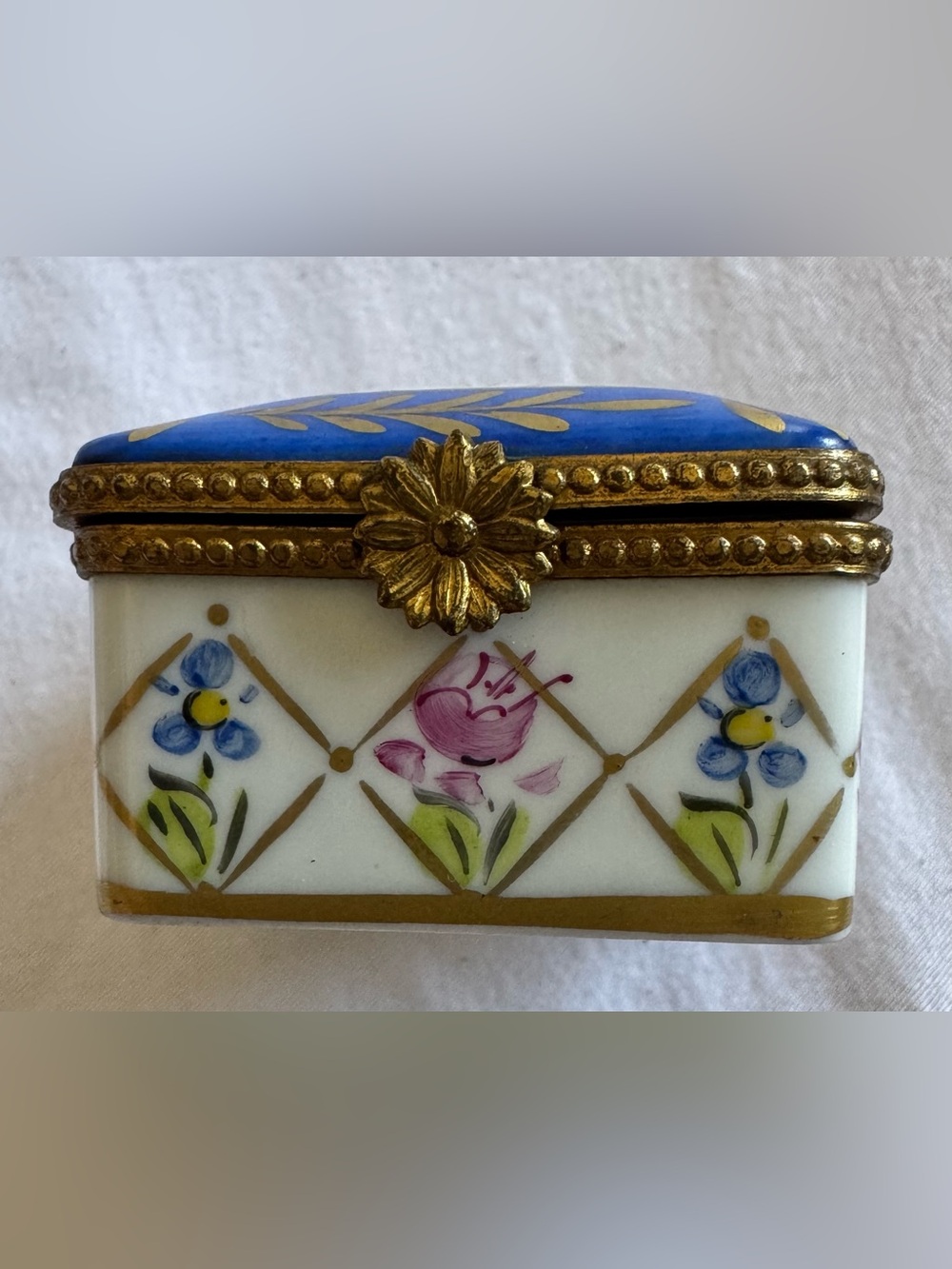 Limoges Decorative Porcelain Trinket pill Box with Blue and Gold Accent.